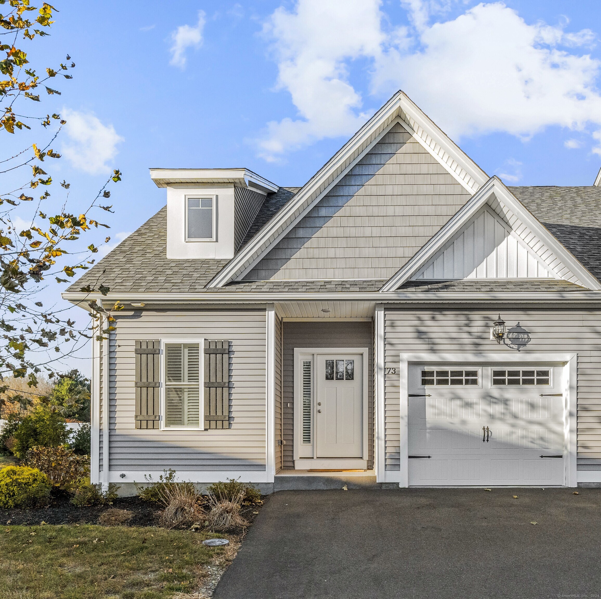 a view of a house with a garage