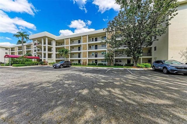 $219,900 | 7461 West Country Club Drive, Unit 407