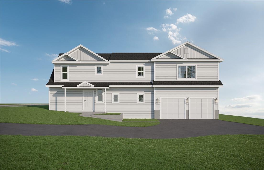 Rendering view of front facade with a garage and a front yard