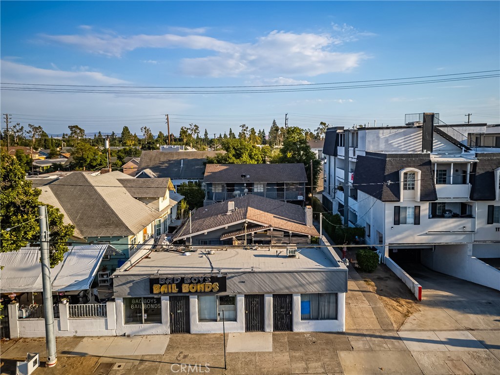 a view of a big building in front of house