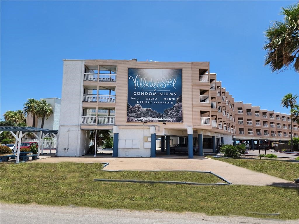 a building view with swimming pool in front of it