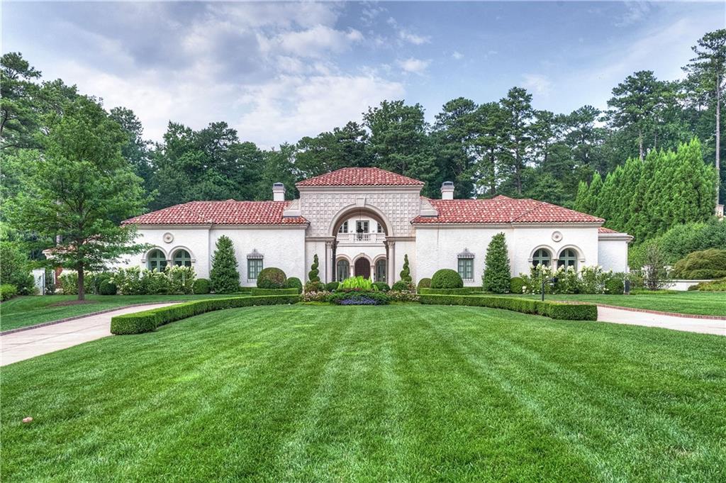 a house view with a garden space