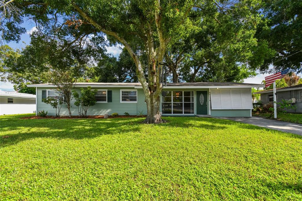 front view of a house with a yard