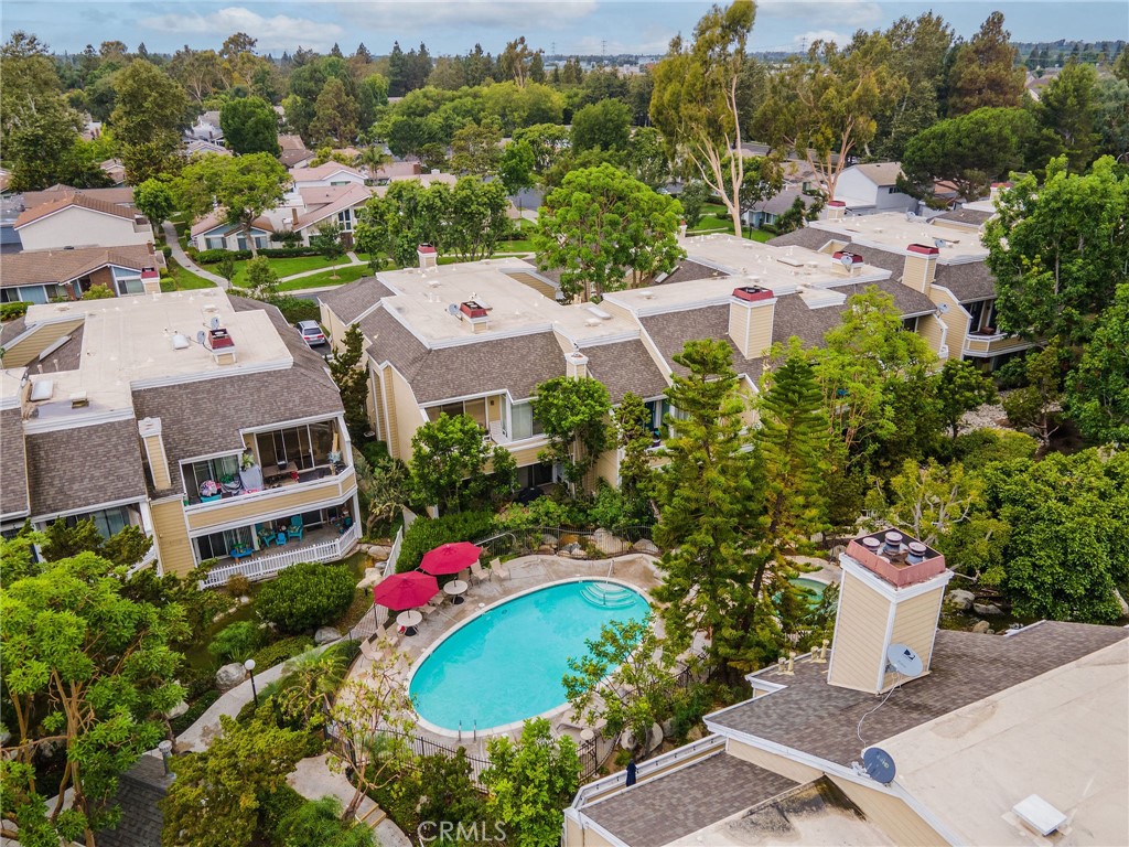 an aerial view of a house with a garden