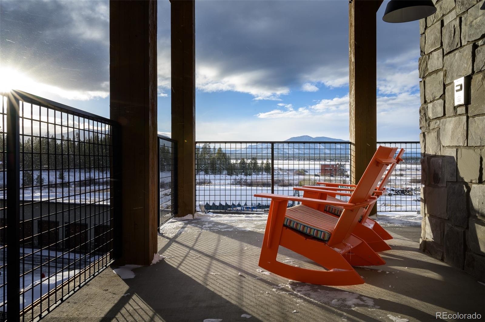 a balcony with wooden floor