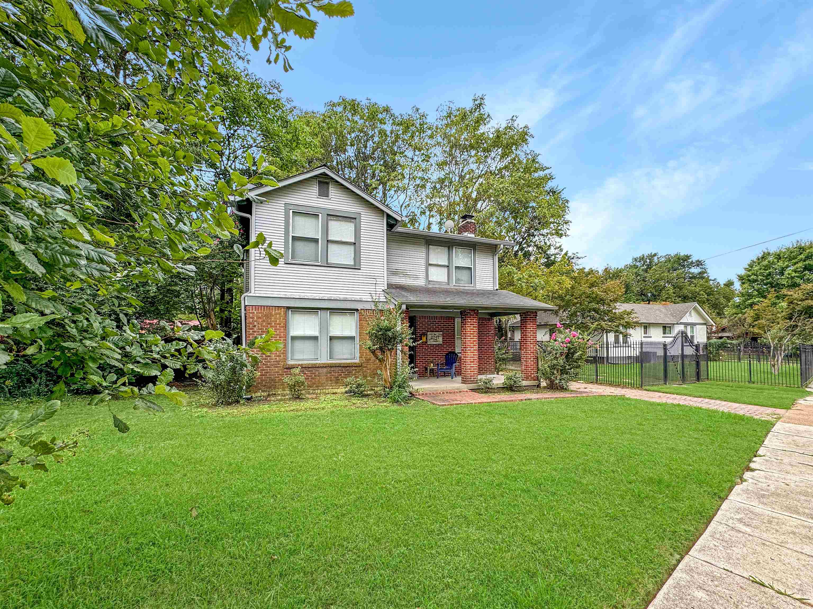 a house view with a garden space