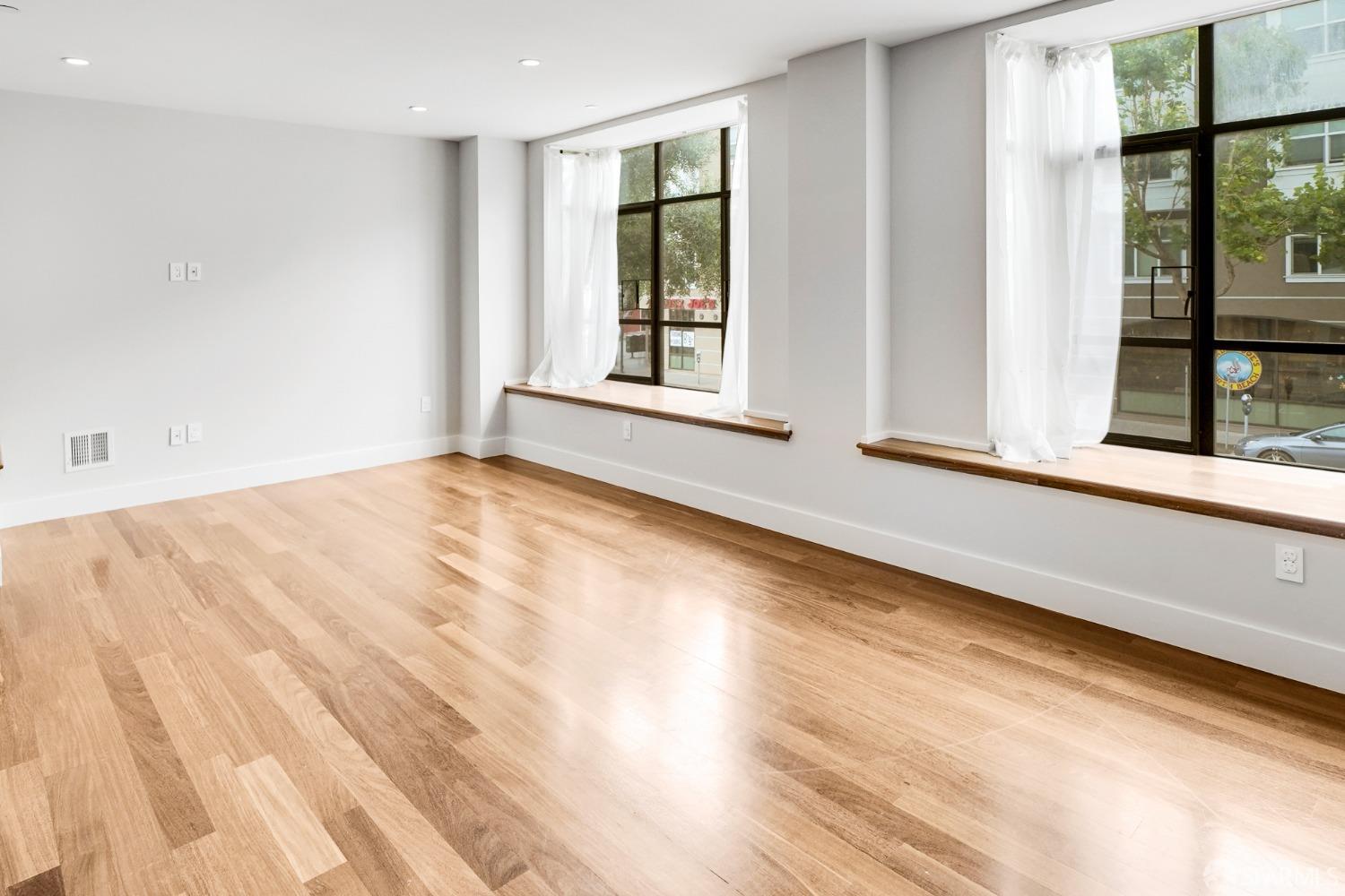 a view of an empty room and window