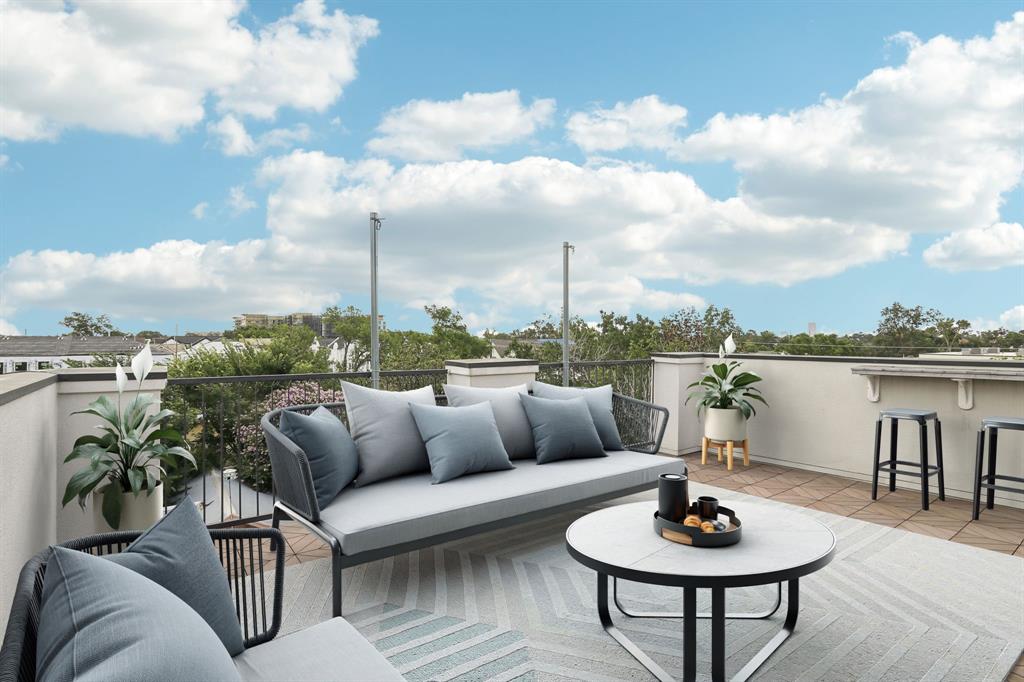 a view of a terrace with couches