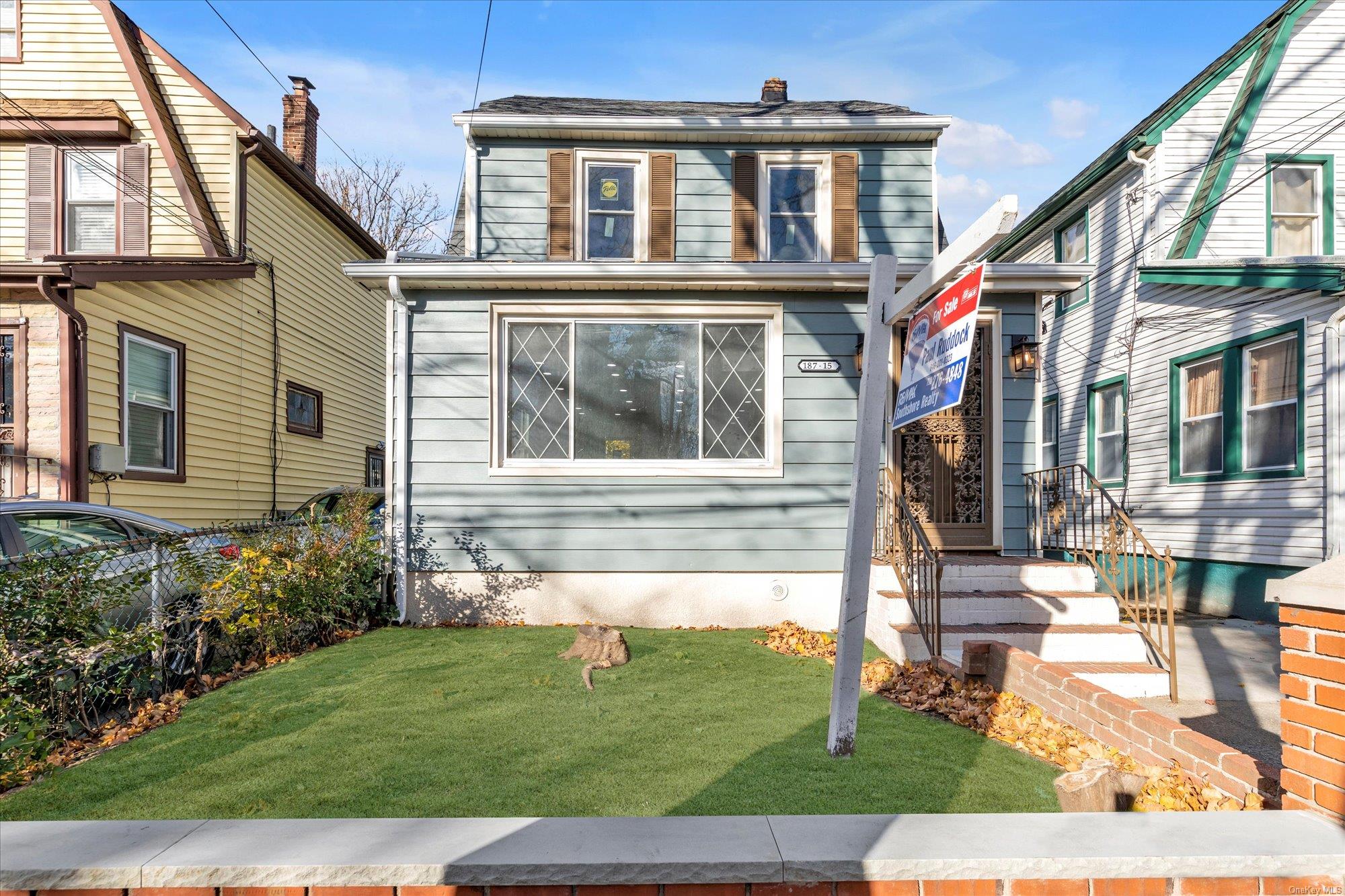 View of front of house with a front lawn