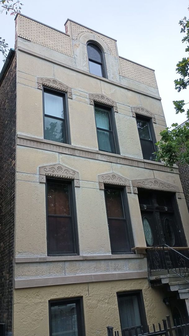 a building with a clock on the wall