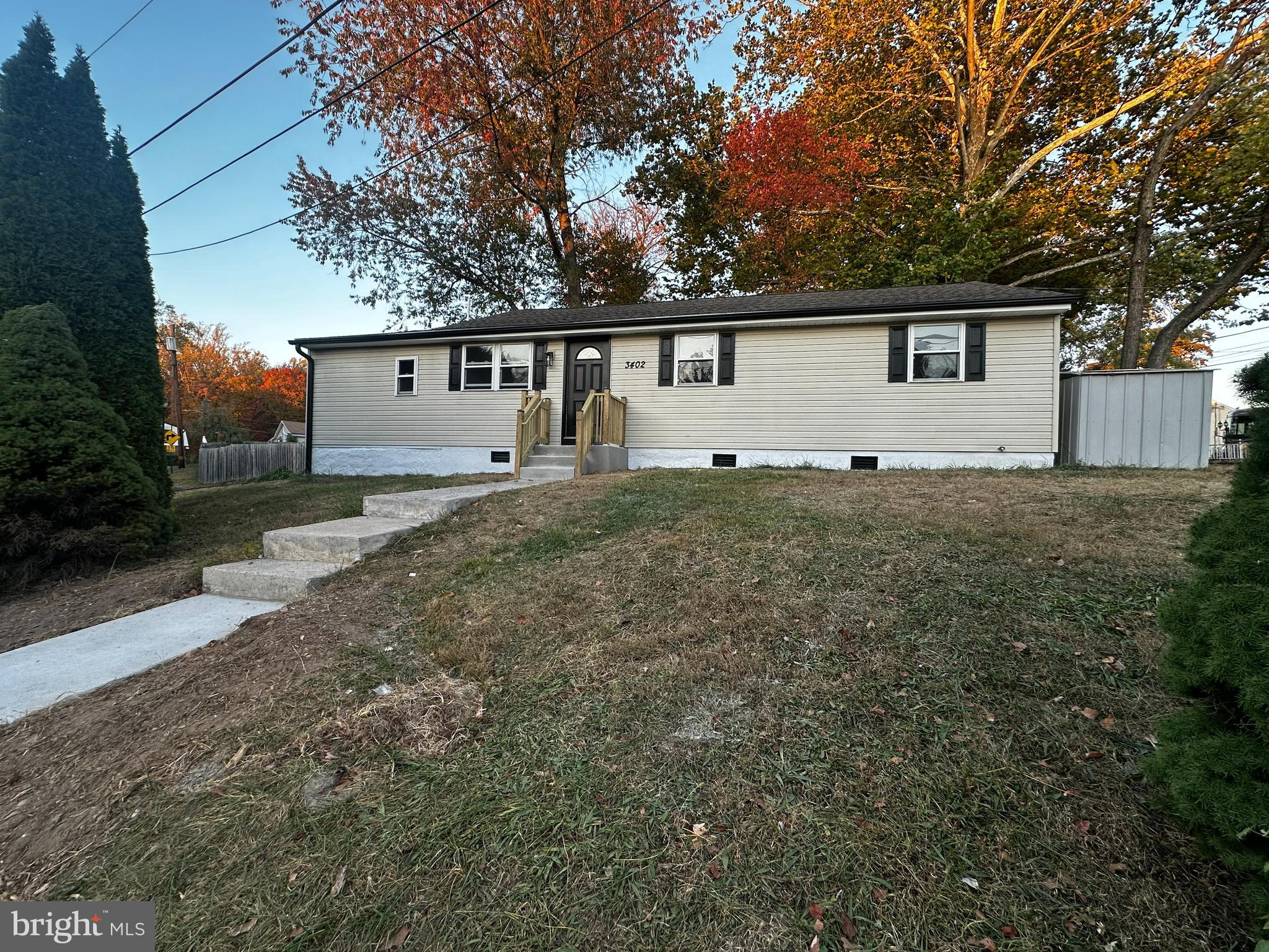 a house that has tree in front of it