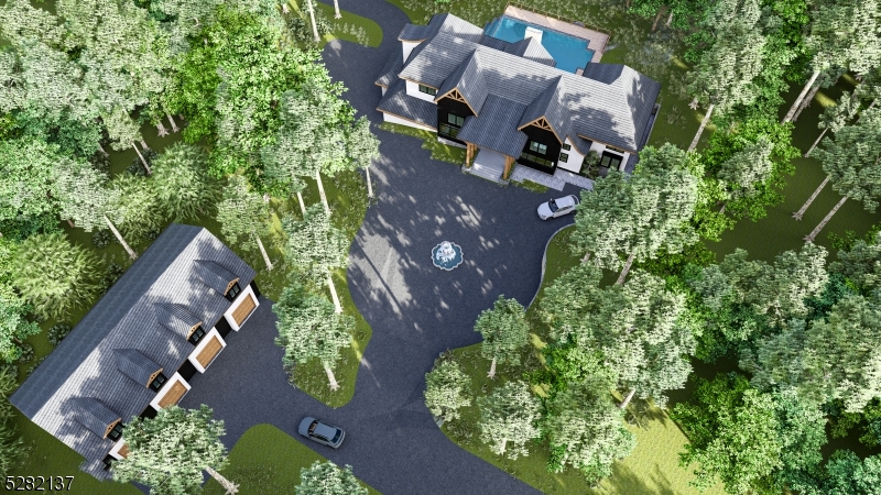 an aerial view of a house with garden space and street view