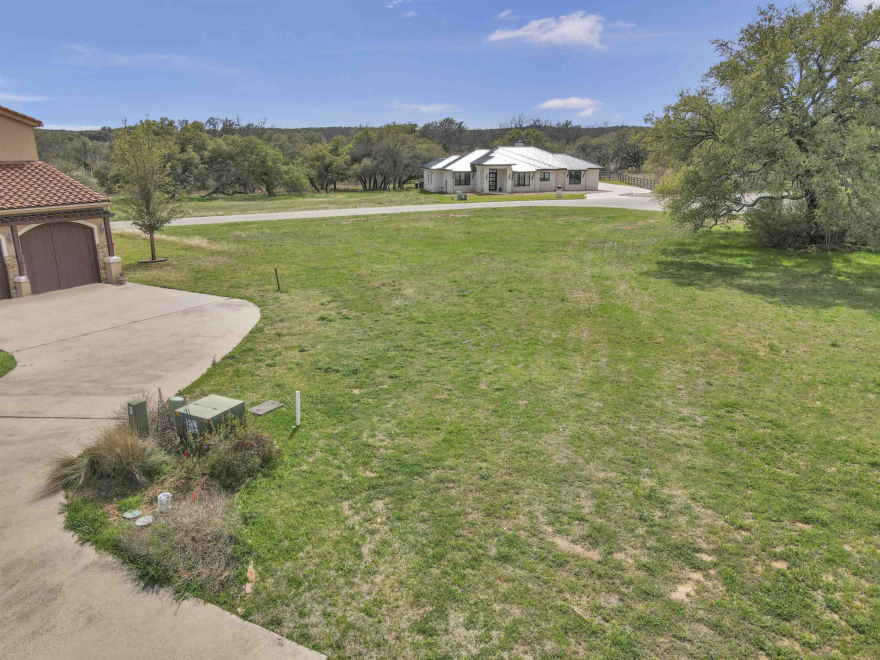 a view of a yard with an outdoor space