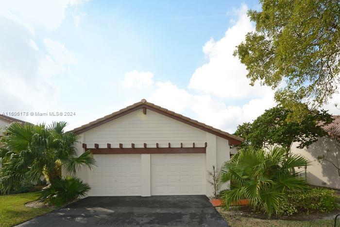 a view of a house with a garage