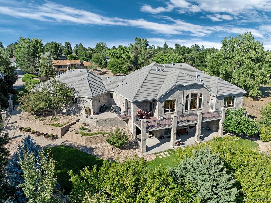 an aerial view of a house with a garden