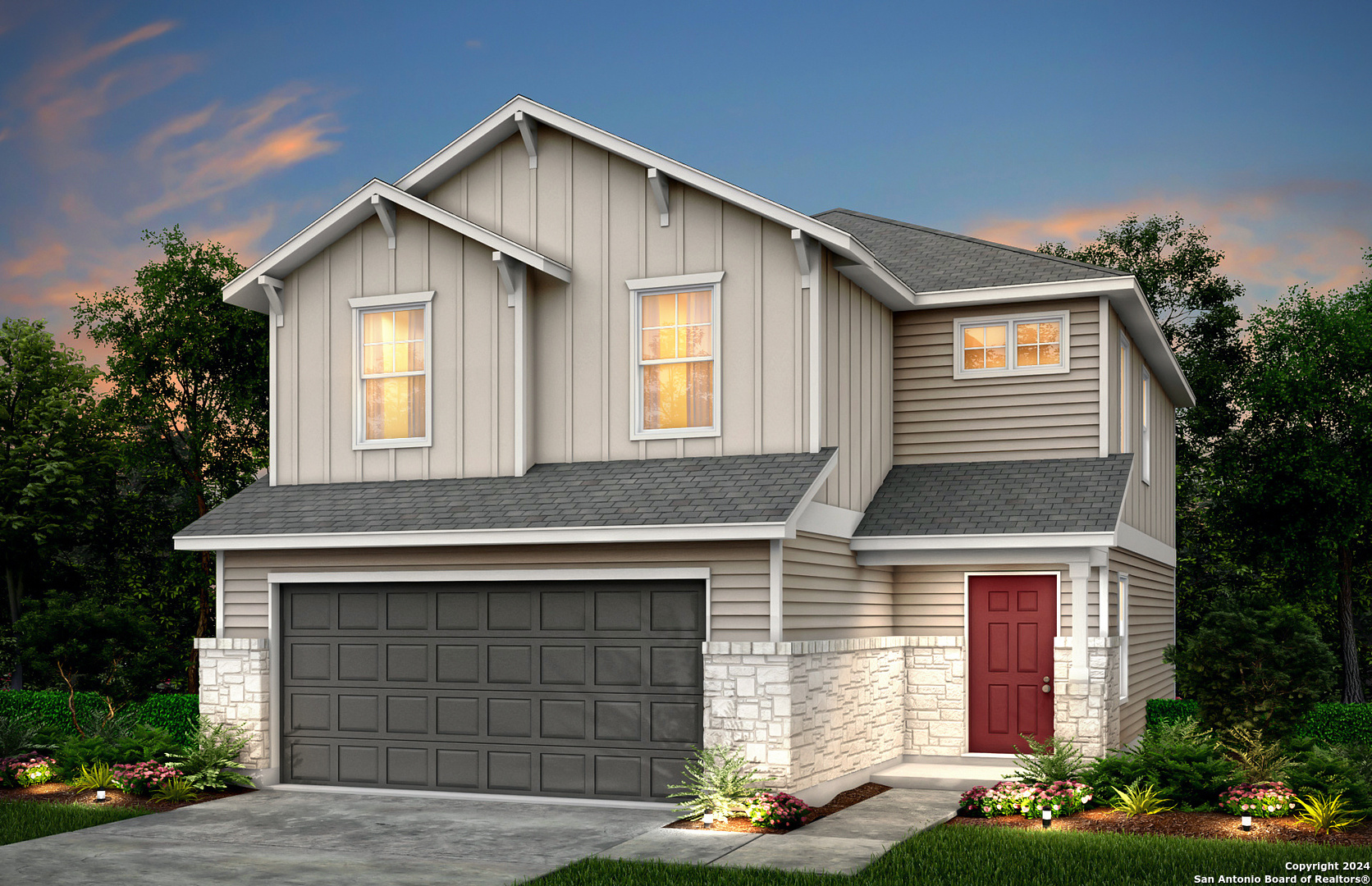 a front view of a house with a yard and garage