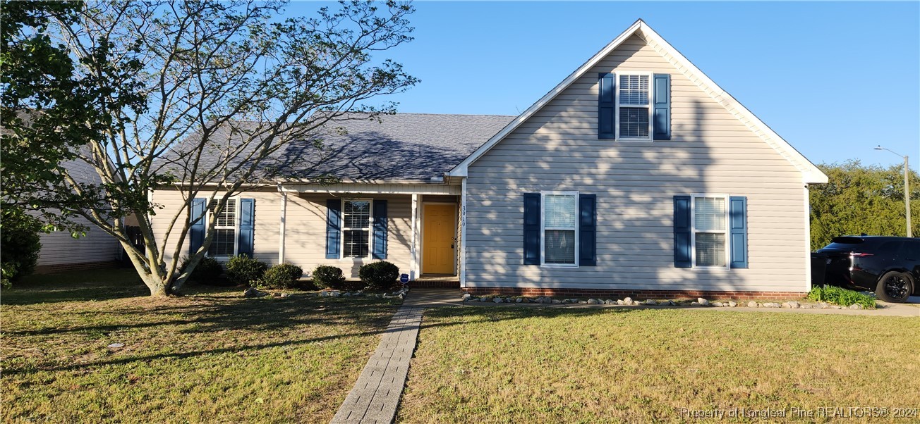 a front view of house with yard