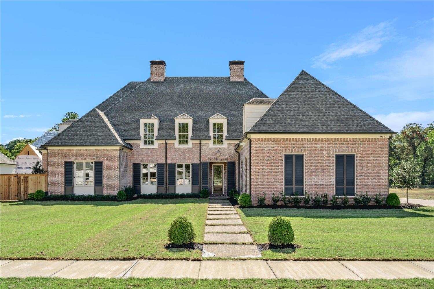 View of front facade with a front lawn