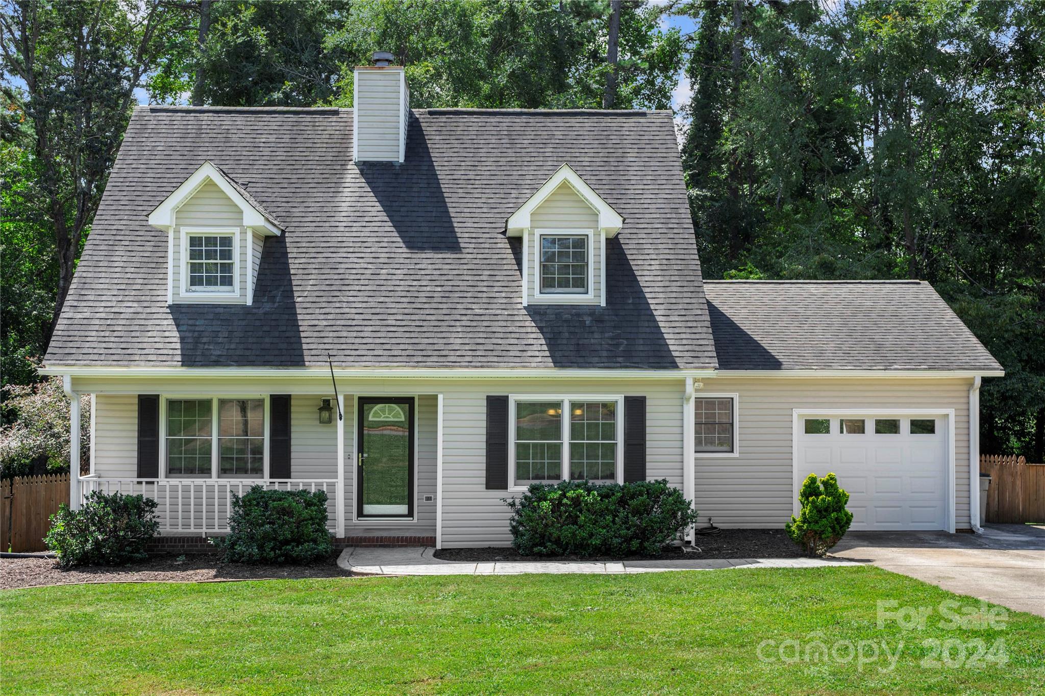 front view of a house and a yard