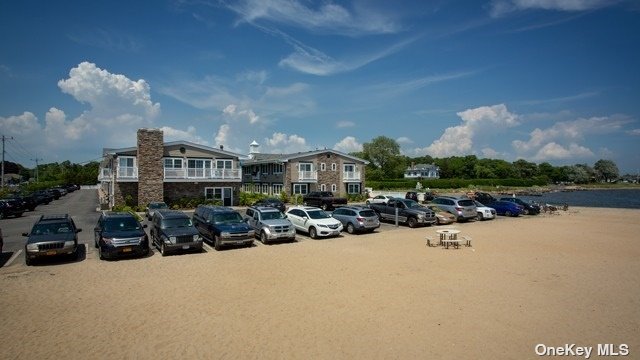 a view of a street with cars