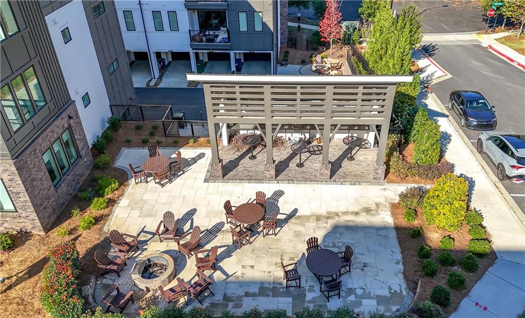 an aerial view of a house with a swimming pool