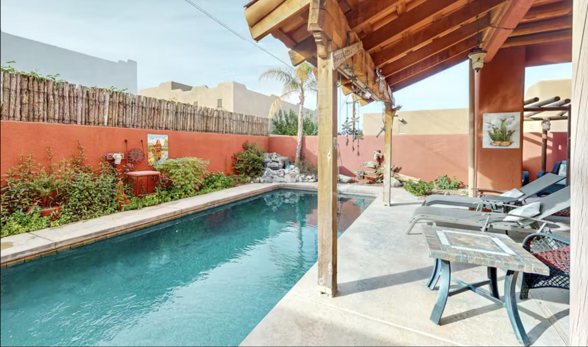 a view of swimming pool from a balcony