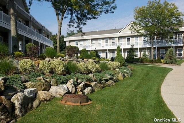 front view of a house with a garden