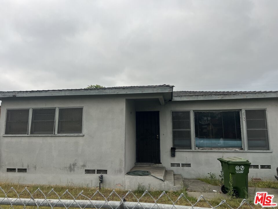 a view of house with outdoor space