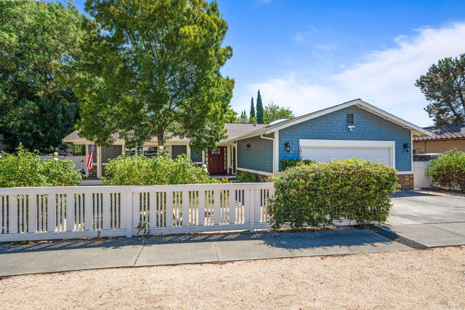 front view of a house with a small yard