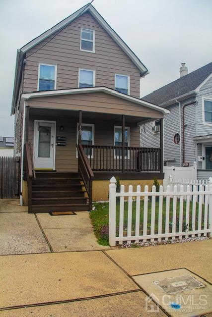 a front view of a house with a porch