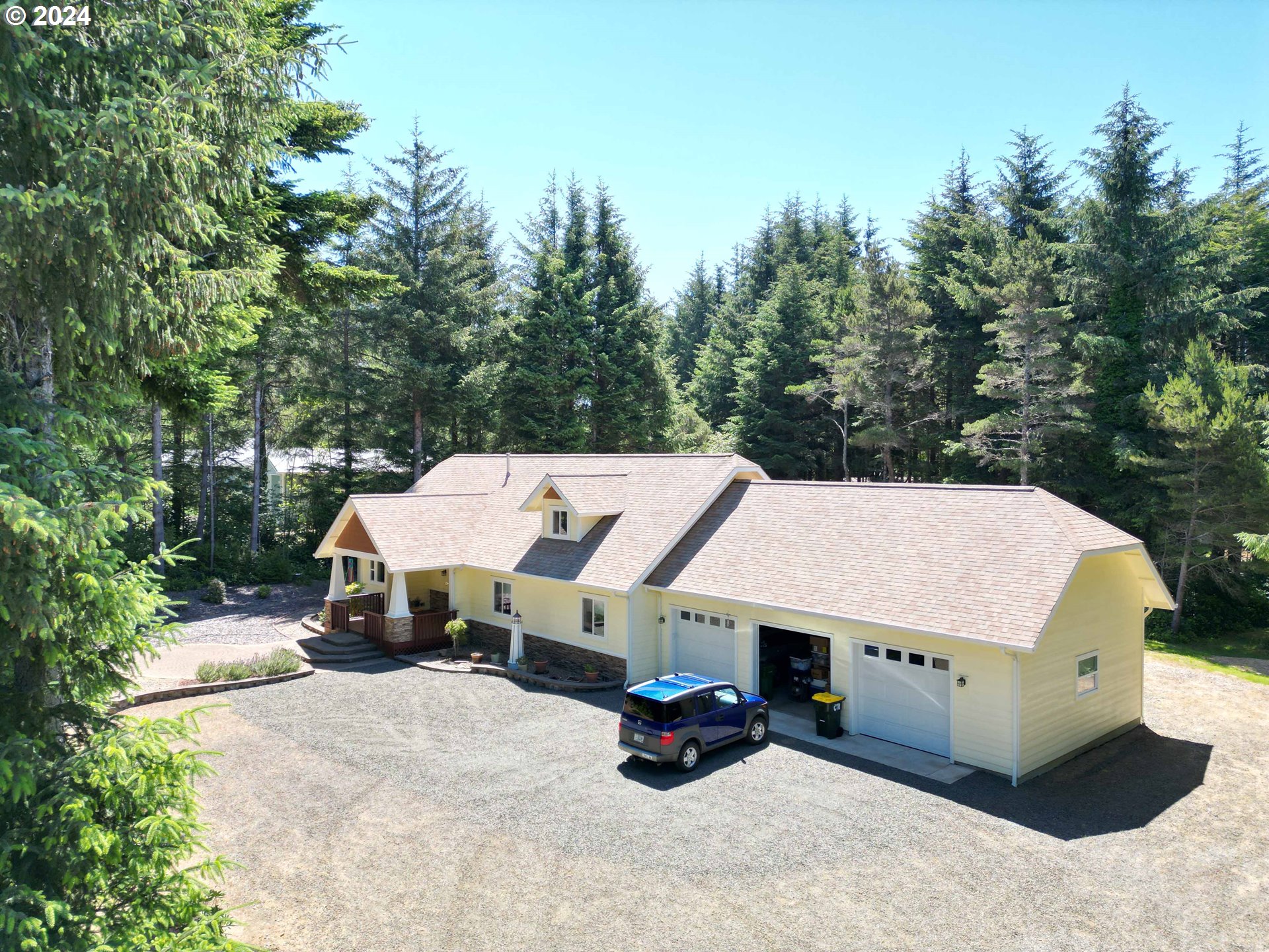 an aerial view of a house with patio