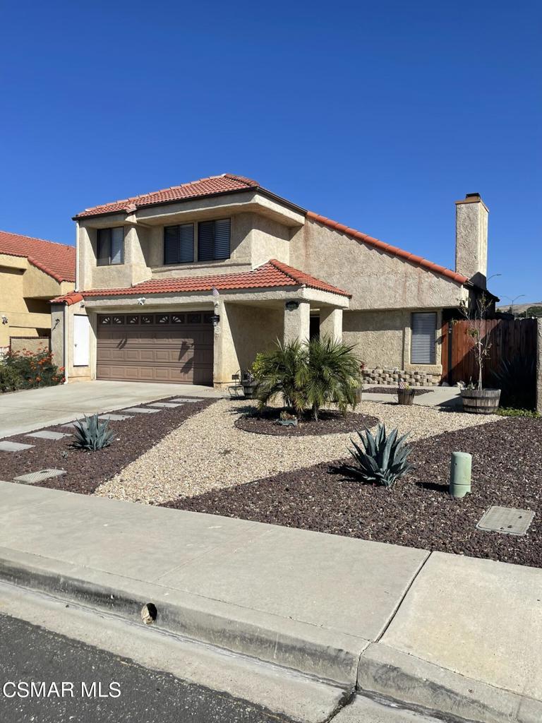 a front view of a house with entertaining space