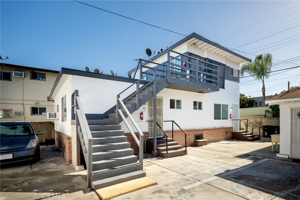 a view of a house with a street