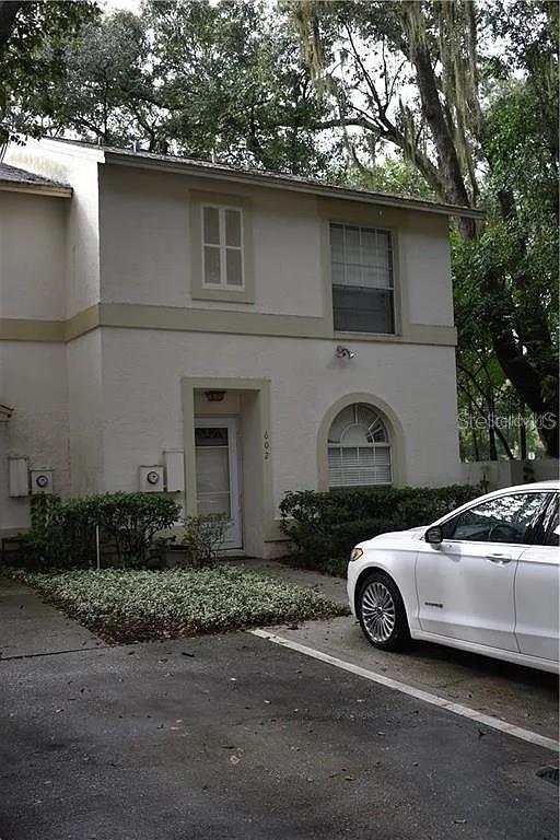 a car parked in front of a house