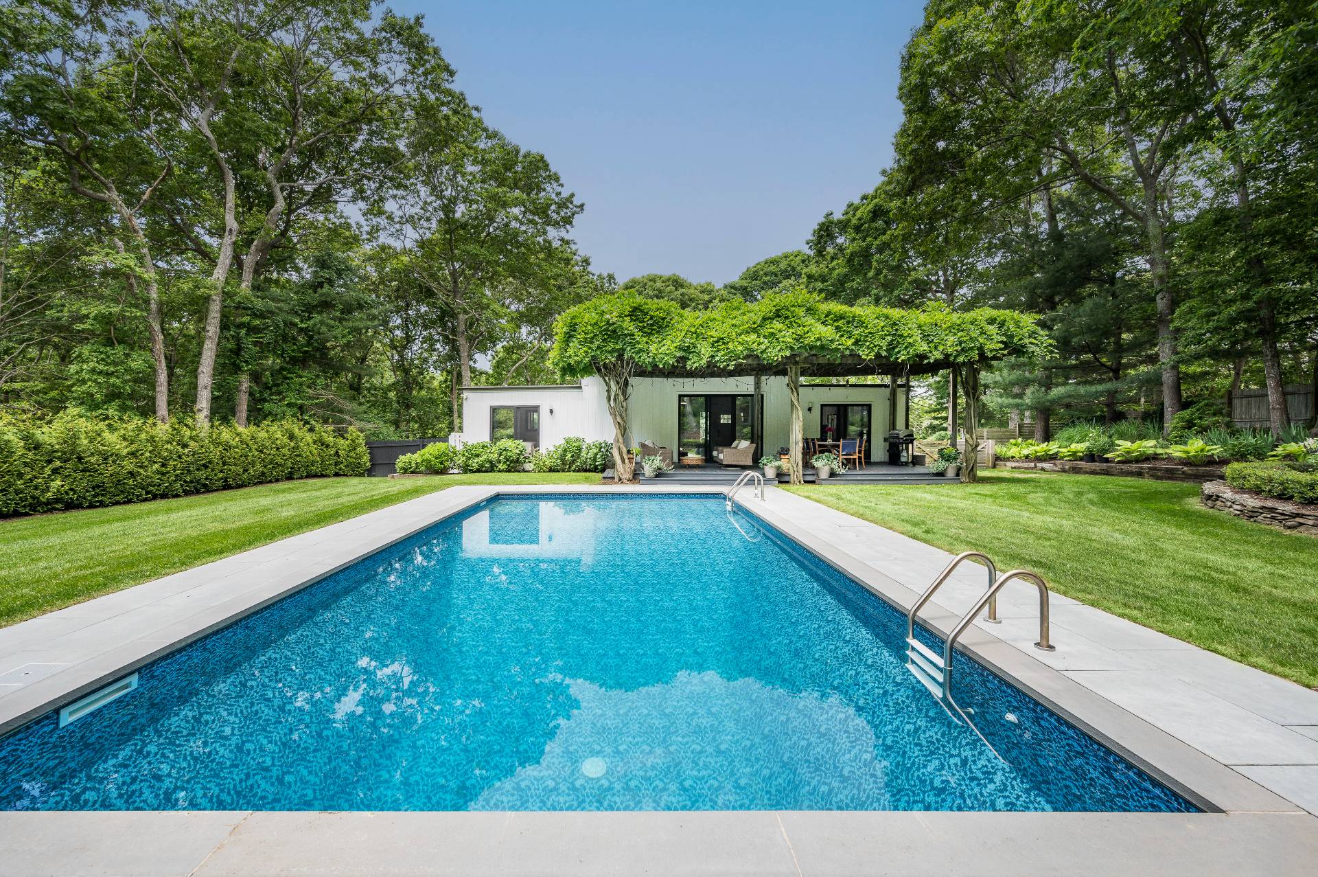 a view of a house with swimming pool