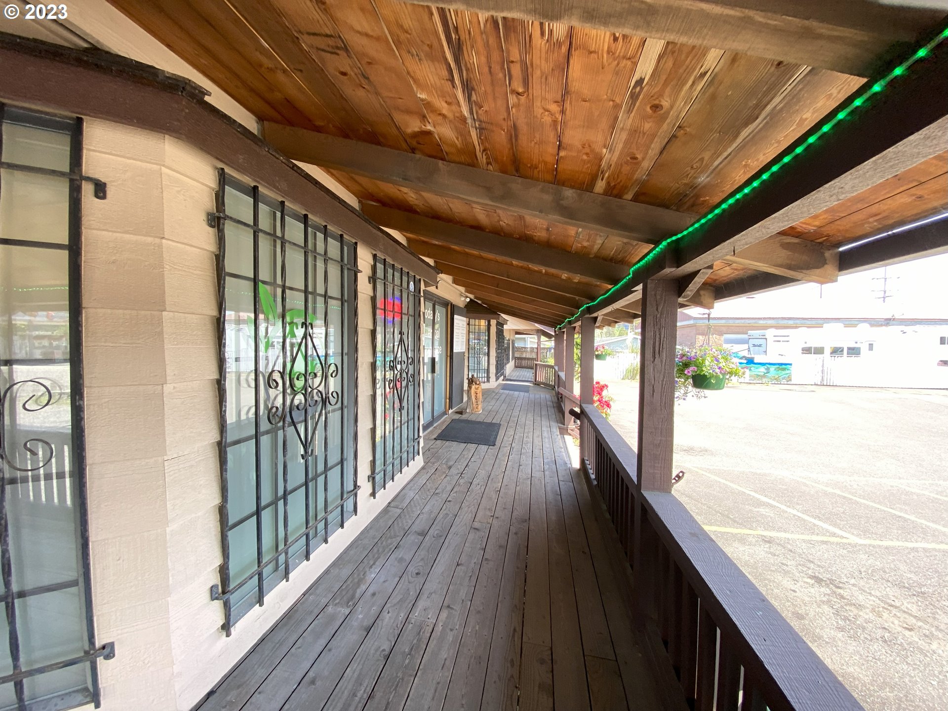 a view of balcony with wooden floor