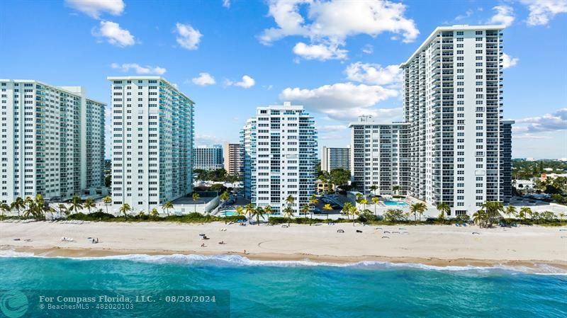 a view of a city with tall buildings