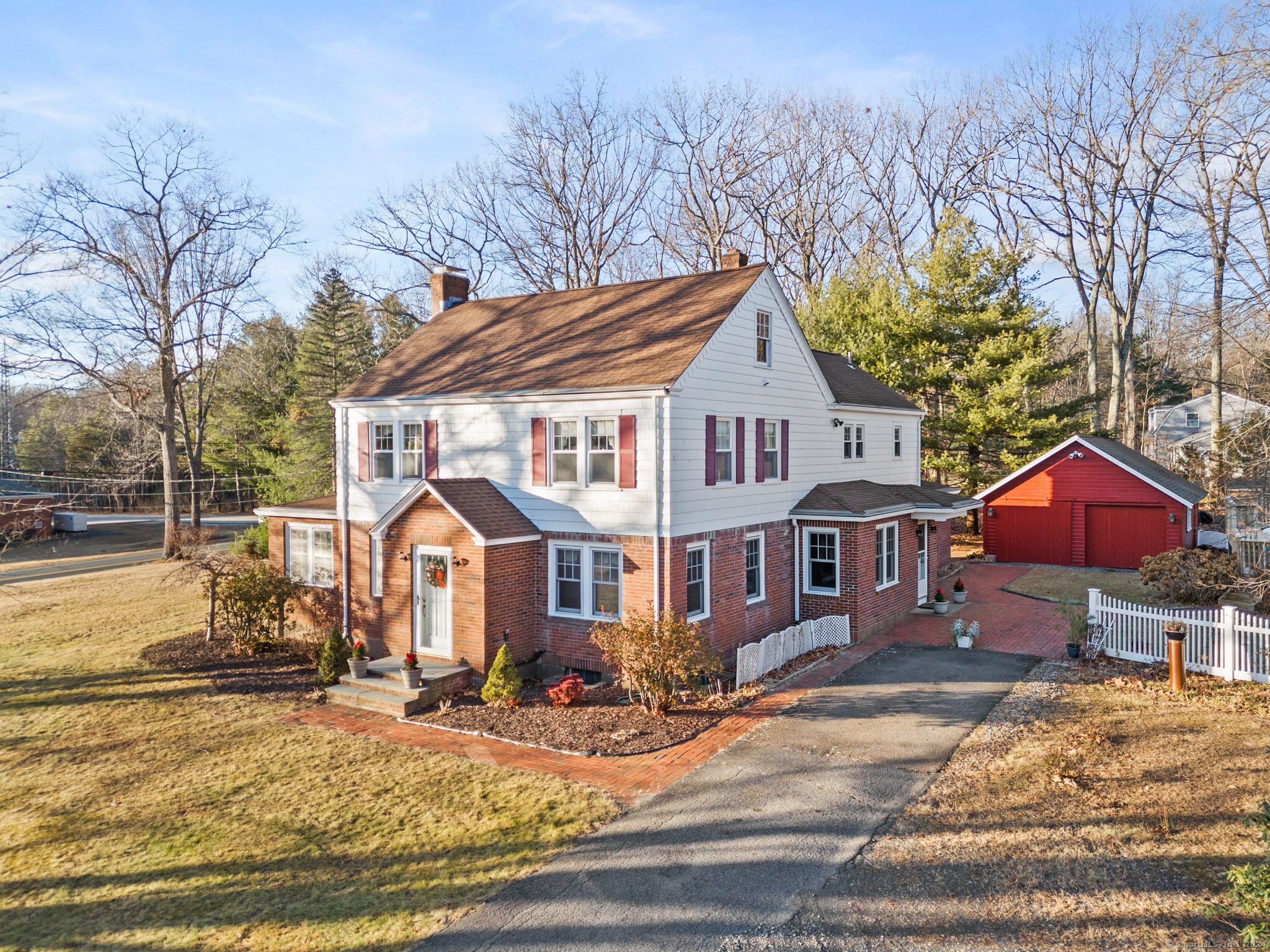 a front view of a house with yard