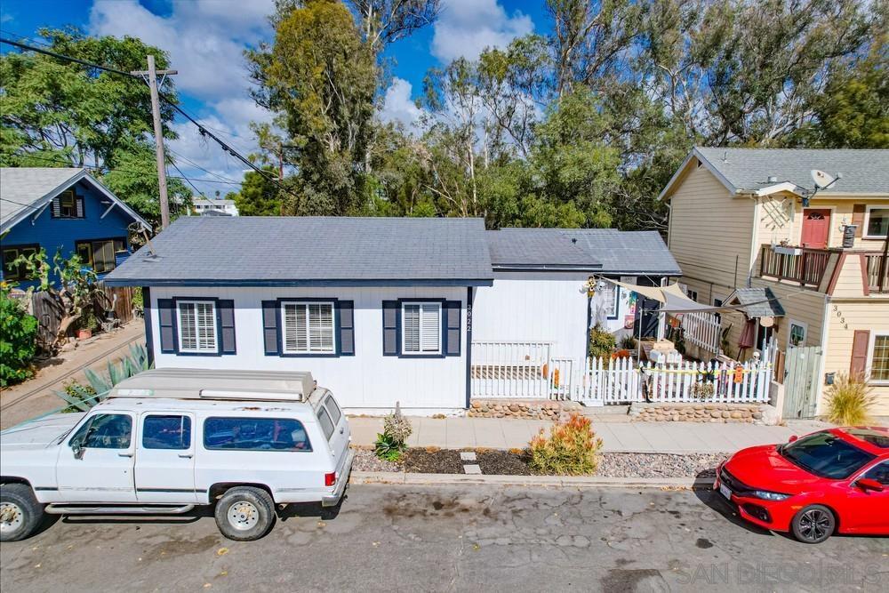 a car parked in front of a house