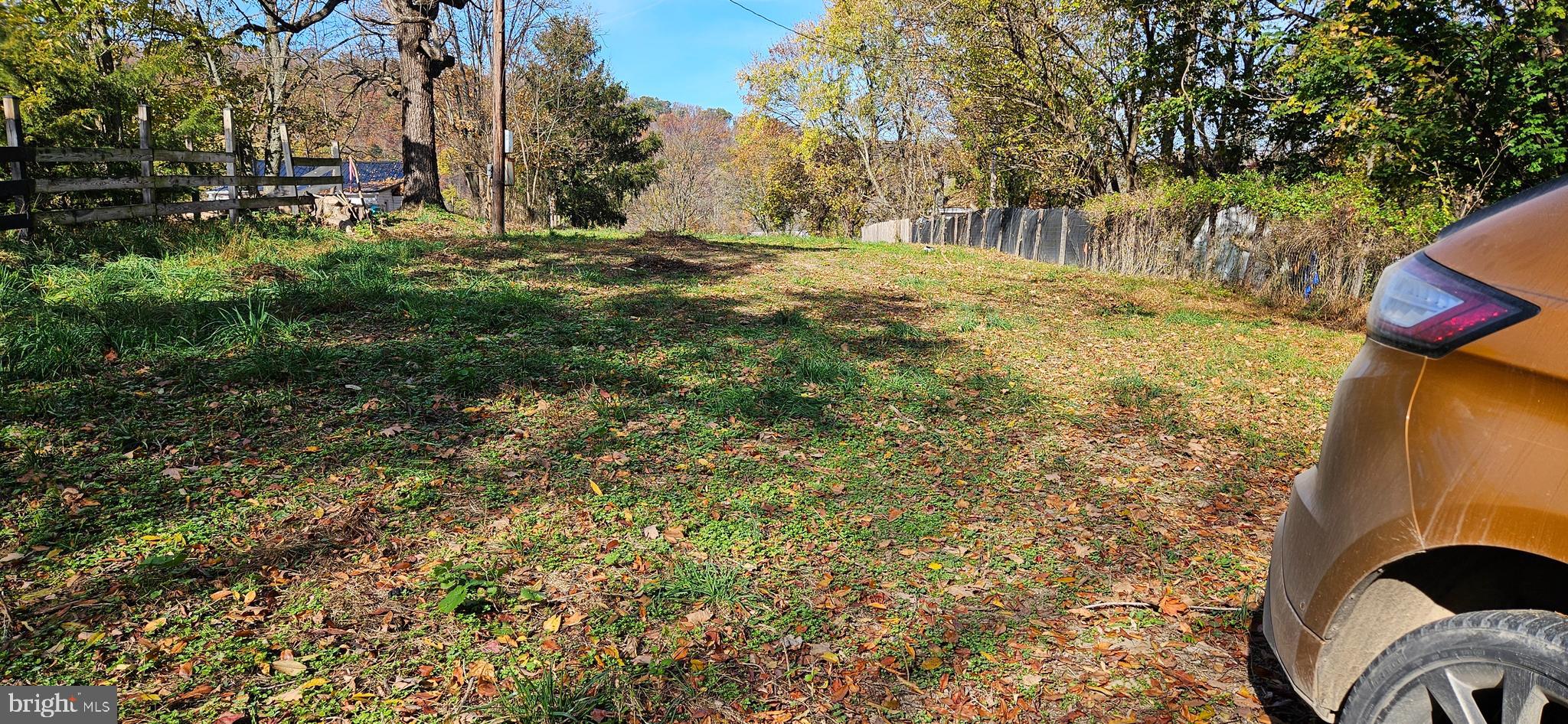 a view of outdoor space and yard