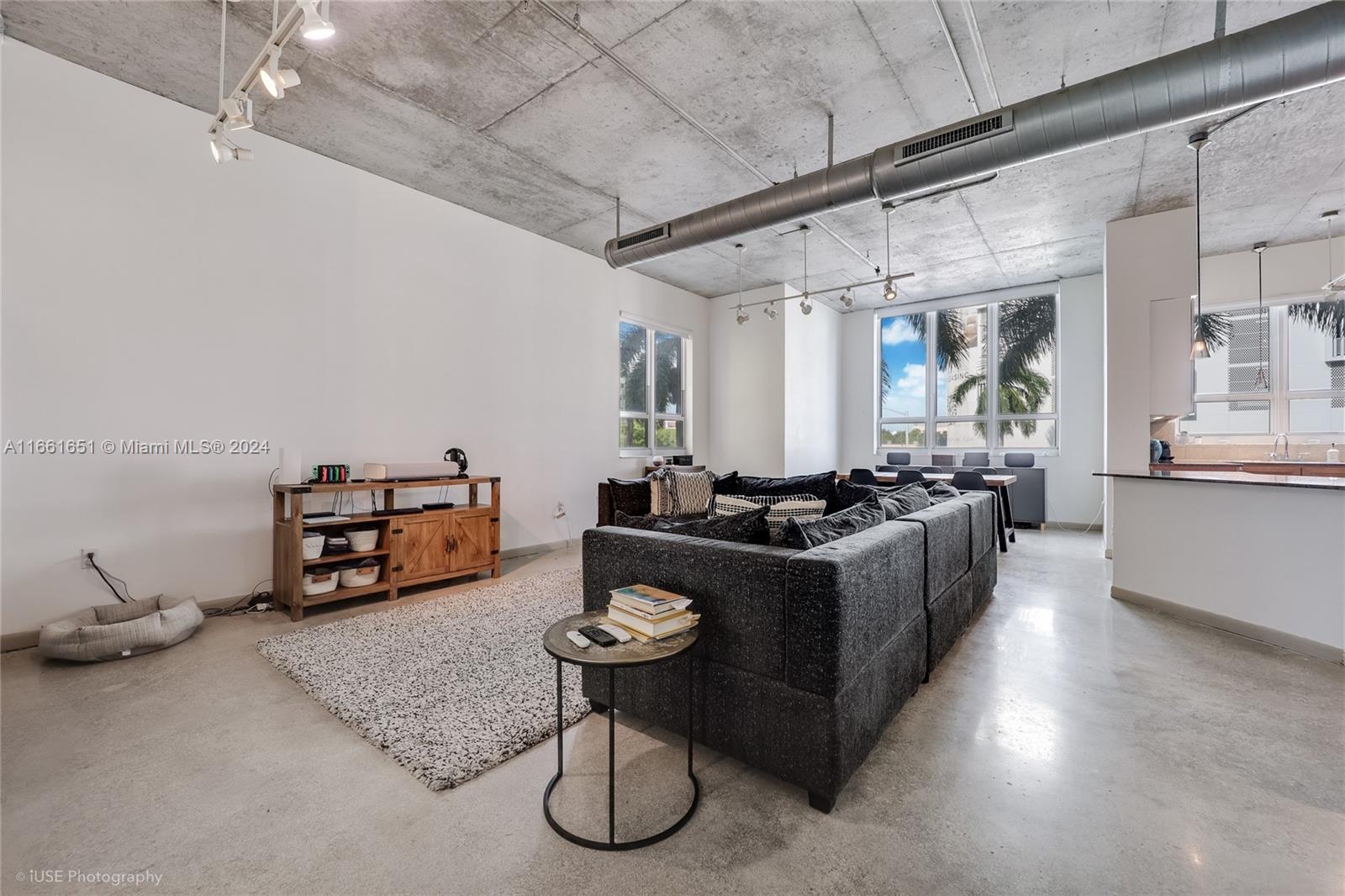 a kitchen with furniture and a table