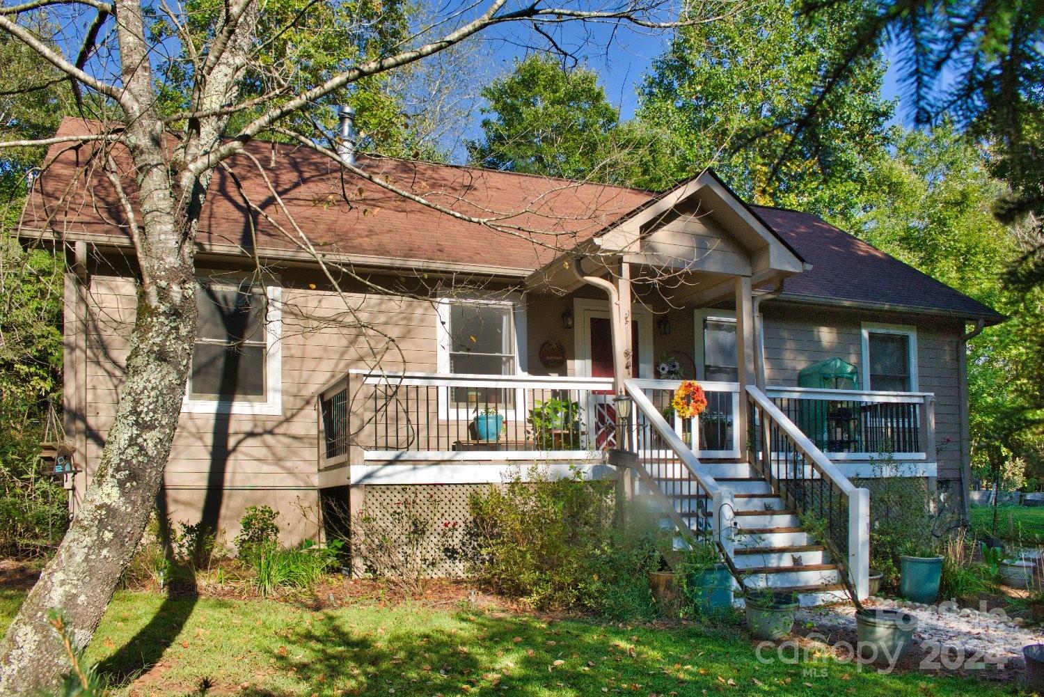 a house with trees in front of it