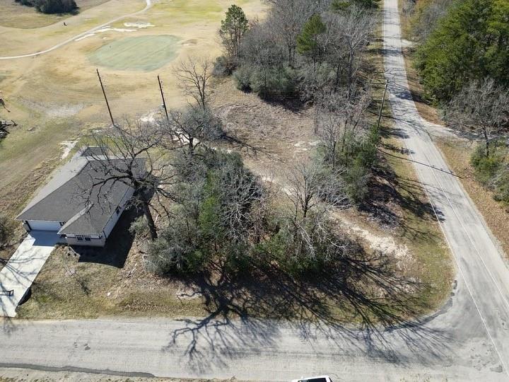 a view of a backyard of the house