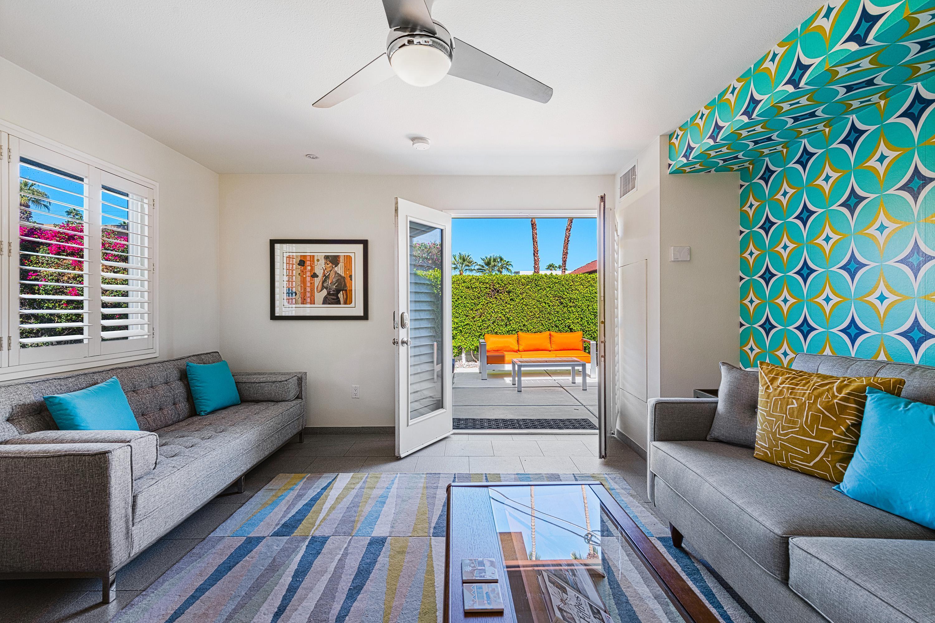 a living room with a couch and a flat screen tv