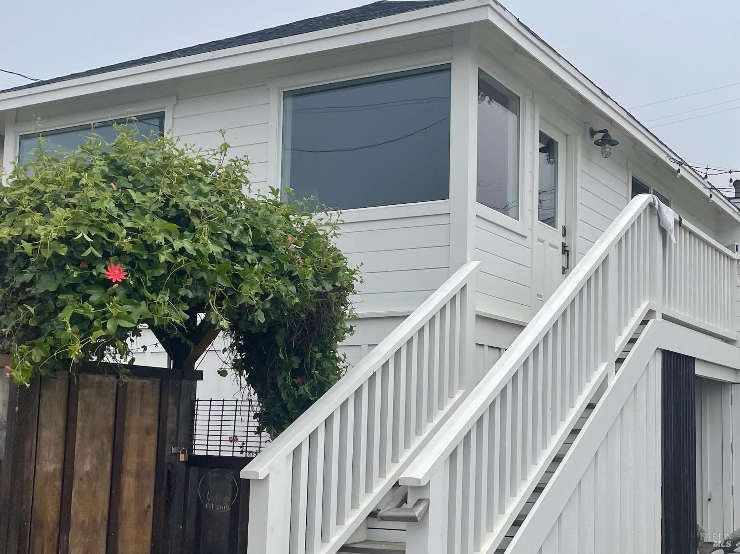 a view of front door and deck