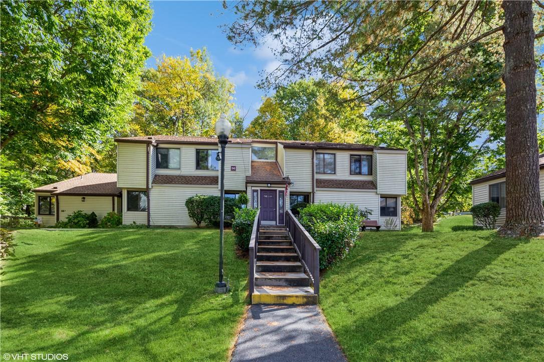 View of front of property featuring a front yard