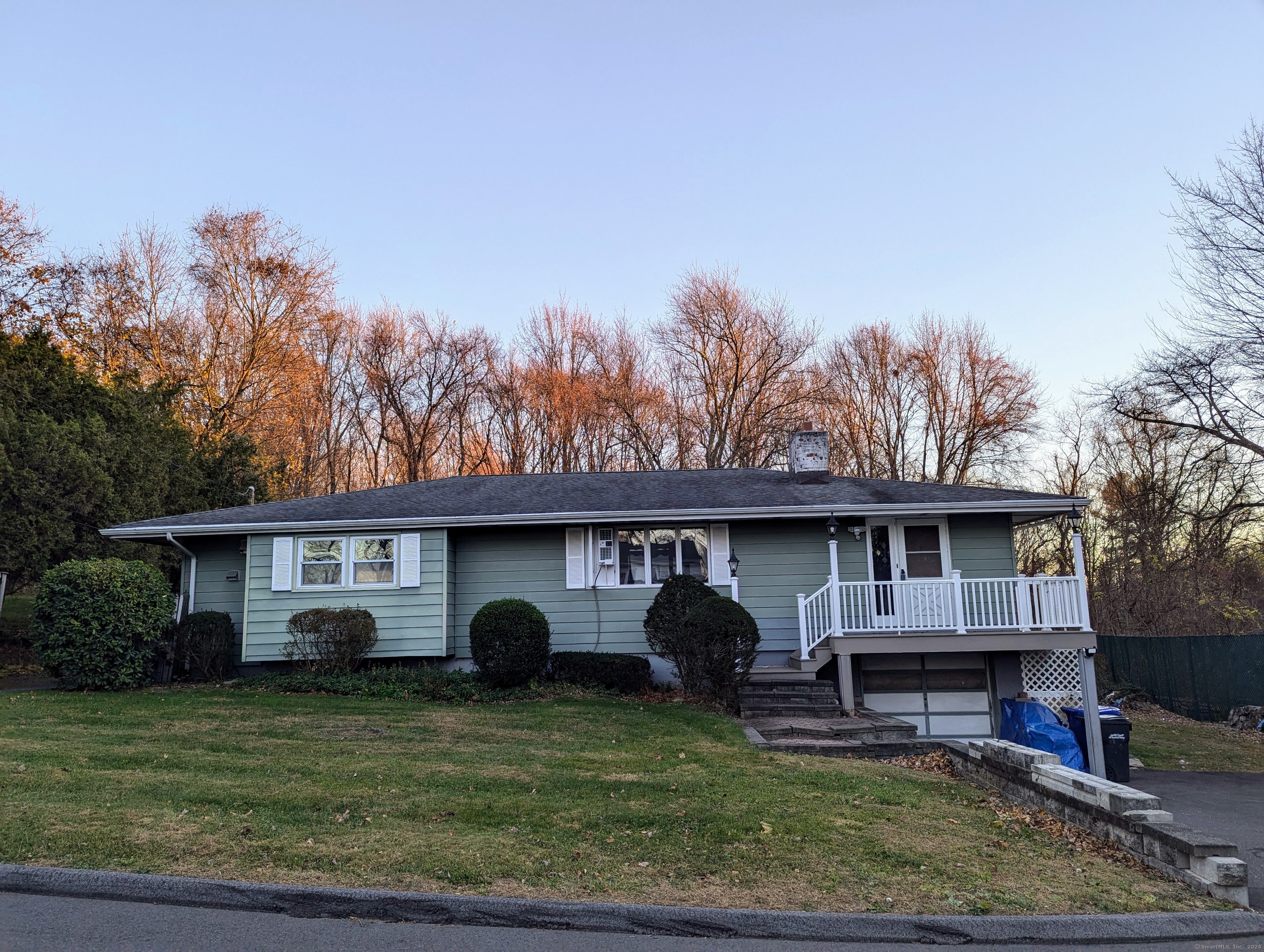 a view of a yard in front of a house