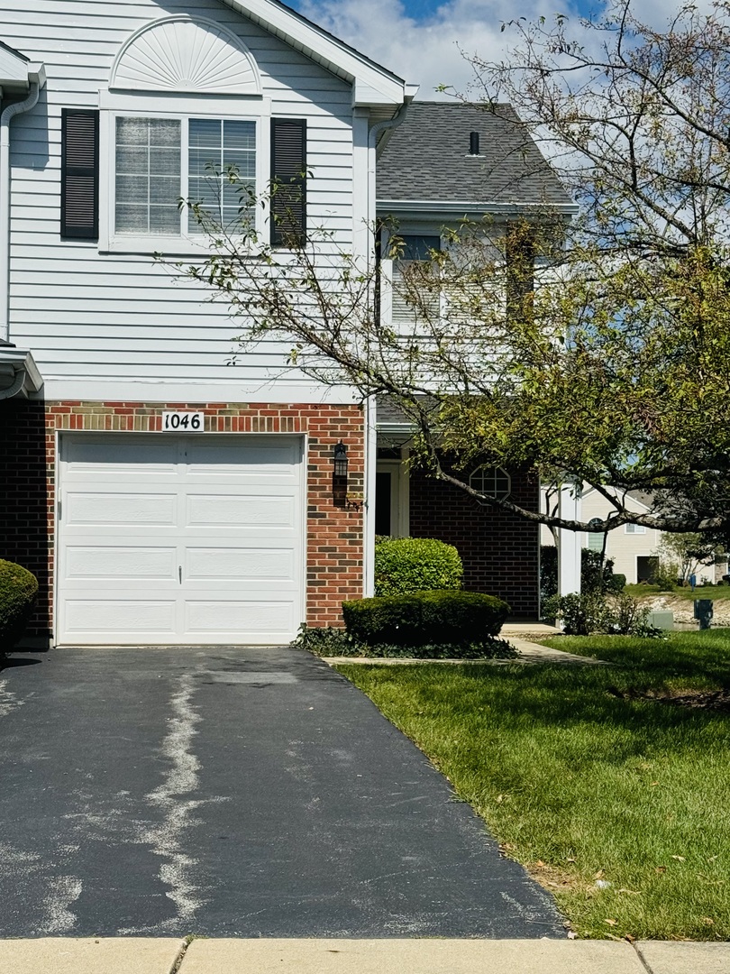 a front view of house with yard