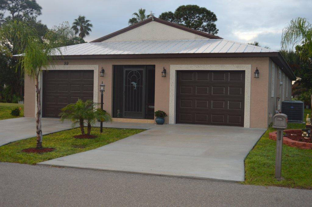 a house with yard in front of it