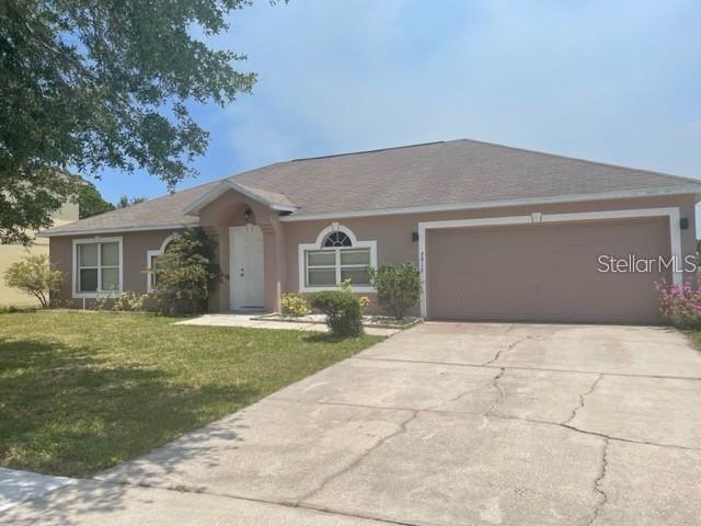 a front view of house with yard